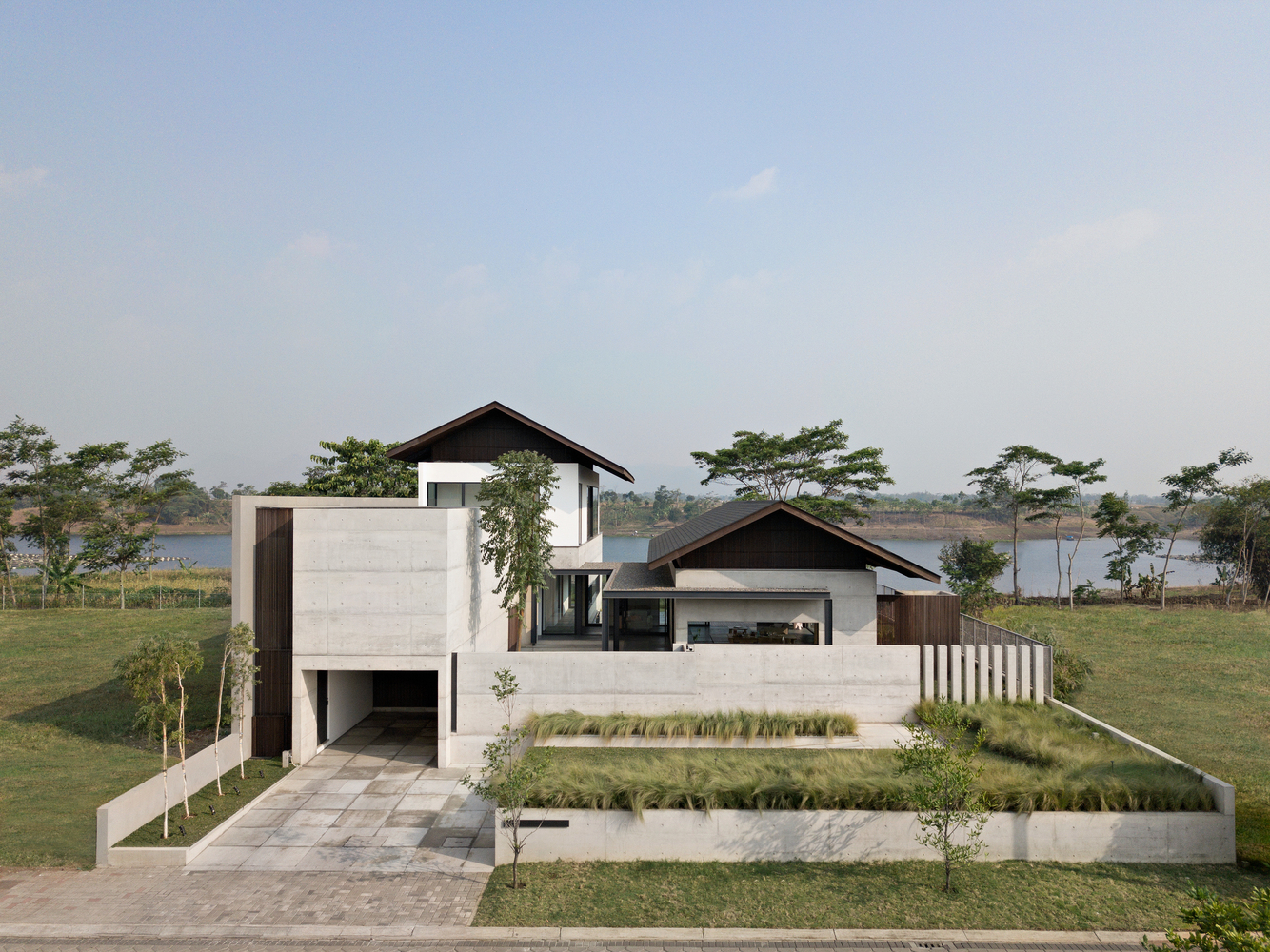 Bare concrete house with Japanese style roof